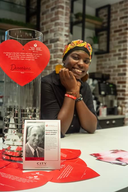 City Furniture’s employees are putting their hearts into fundraising for the American Heart Association’s March 17 Broward Heart Walk. Pictured is Jamie Harden, bartender at City Furniture’s in-store KC Cafe &amp; Wine Bar.
