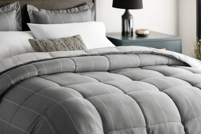 The new Chambray Comforter Set exclusive to the Woven™ linen collection.