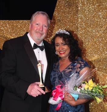 Franchise Owner of the Year Lynne Lawson with James S. Bugg, Jr., Decorating Den Interiors president and CEO.