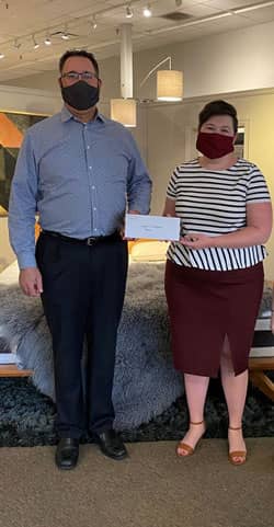 Travis Garrish of Forma Furniture in Fort Collins, CO. The retailer teamed up with local charity Neighbor to Neighbor and donated funds raised from the Stressless Charity promotion to the organization. 