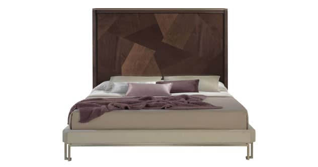 The BOND King Size Bed BOKP11 features a geometric-patterned wood headboard and a playful contemporary statement piece.