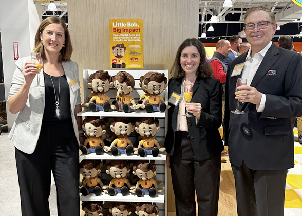 Bill Barton, President &amp; CEO of Bob’s Discount Furniture (right) toasts the opening of the company’s flagship experience location in Somerville alongside Rachel Nadkarni, Director of Economic Development, City of Somerville (center) and Felicity Beal, Director of Development, Greater Somerville Homeless Coalition (left).