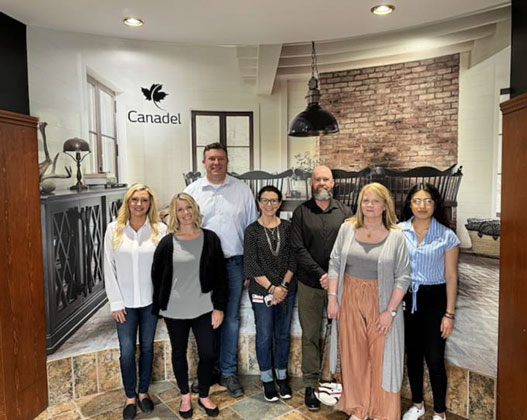 Darvin Furniture &amp; Mattress President Will Harris along with other Darvin management and associates visit the Canadel Furniture manufacturing facility.